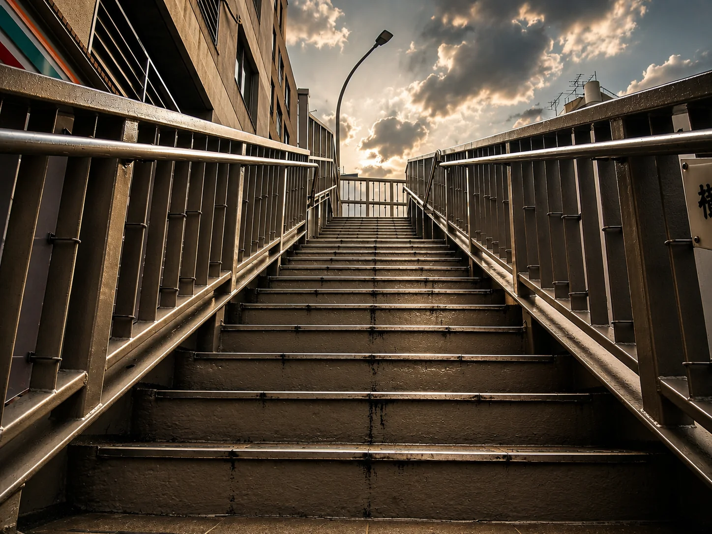 Tokyo stairway rising into bright city light