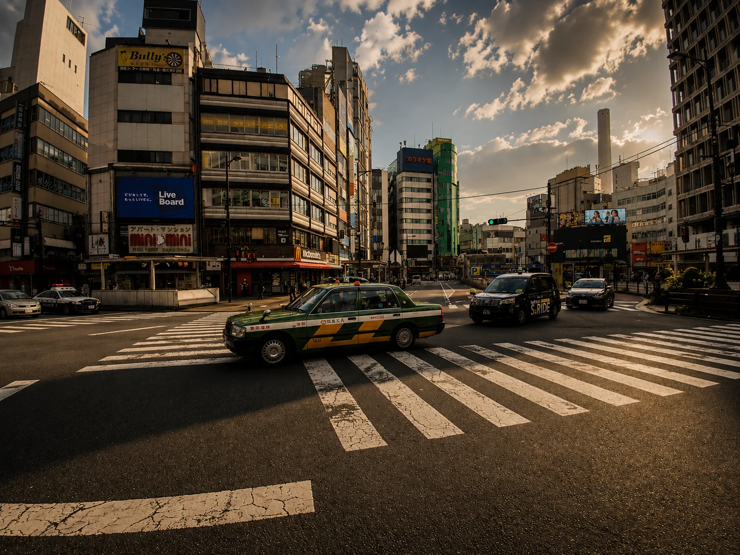 A Tokyo taxi waiting beneath a wide evening sky